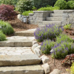 A professional landscaping job with stone path and stone steps.